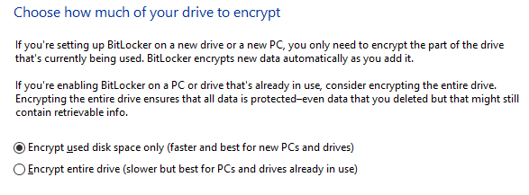 BitLocker setup interface showing options to choose between encrypting only the used disk space or the entire drive, with descriptions for each option.