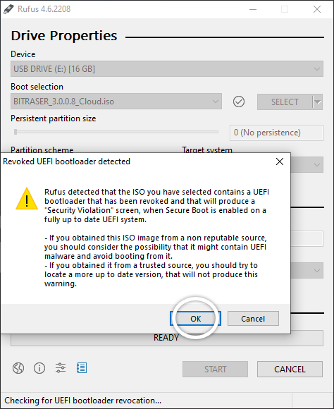 Revoled UEFI Bootloader detected dialog box open; OK button highlighted with a white outlined circle